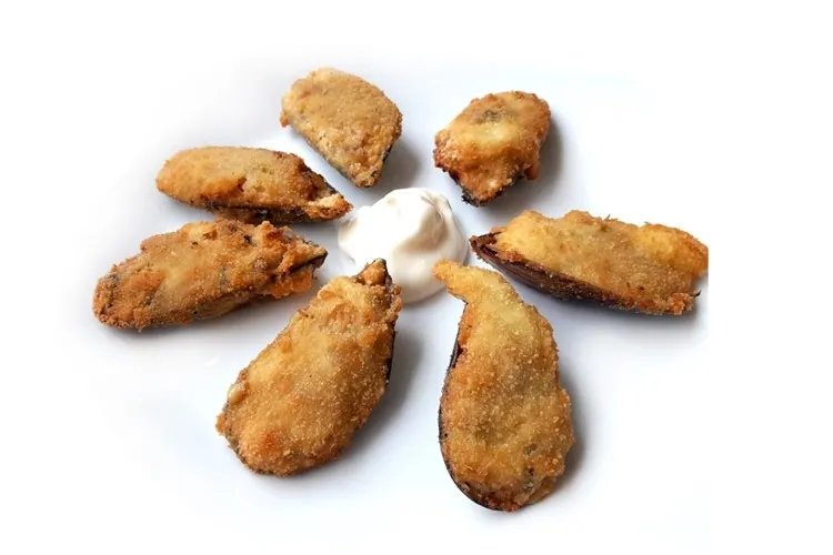 Mejillones tigre gratinados rellenos con besamel